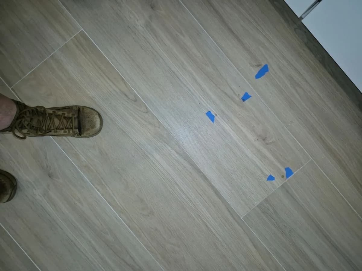 Flooring defect flagged on a new-construction inspection