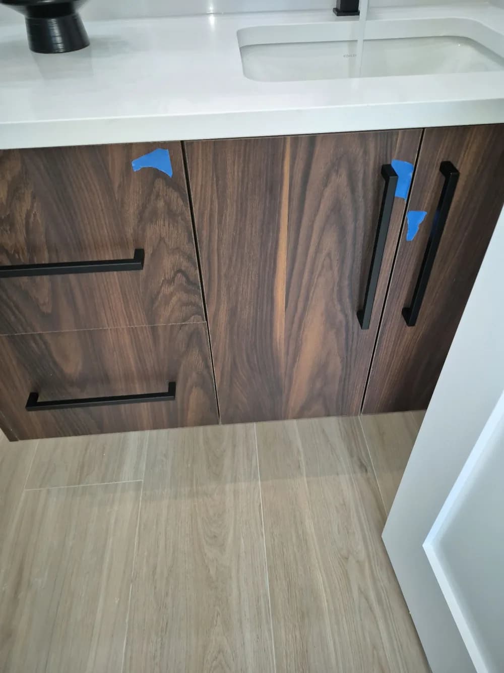 Cabinetry defect flagged on a new-construction inspection